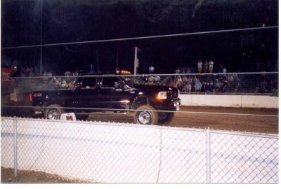 my 2003 truck pulling the sled at the buck 2.jpg