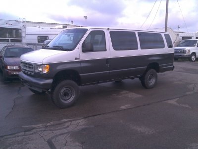 2005 E350 4x4 Quigly 15 pass Ford Van.jpg
